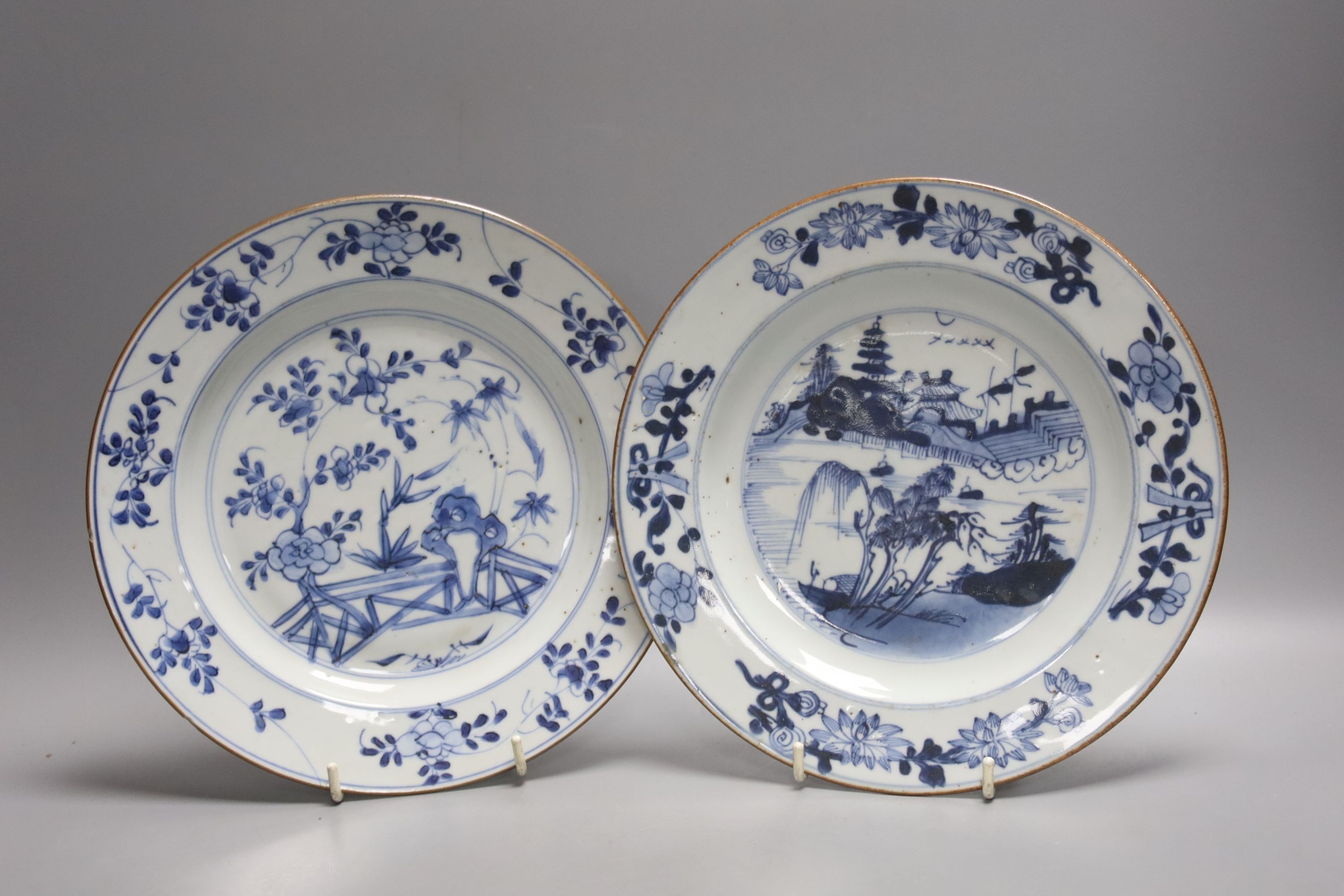 Two 18th century Chinese export blue and white plates, a pair of Chinese Imari patterned plates and four famille rose plates